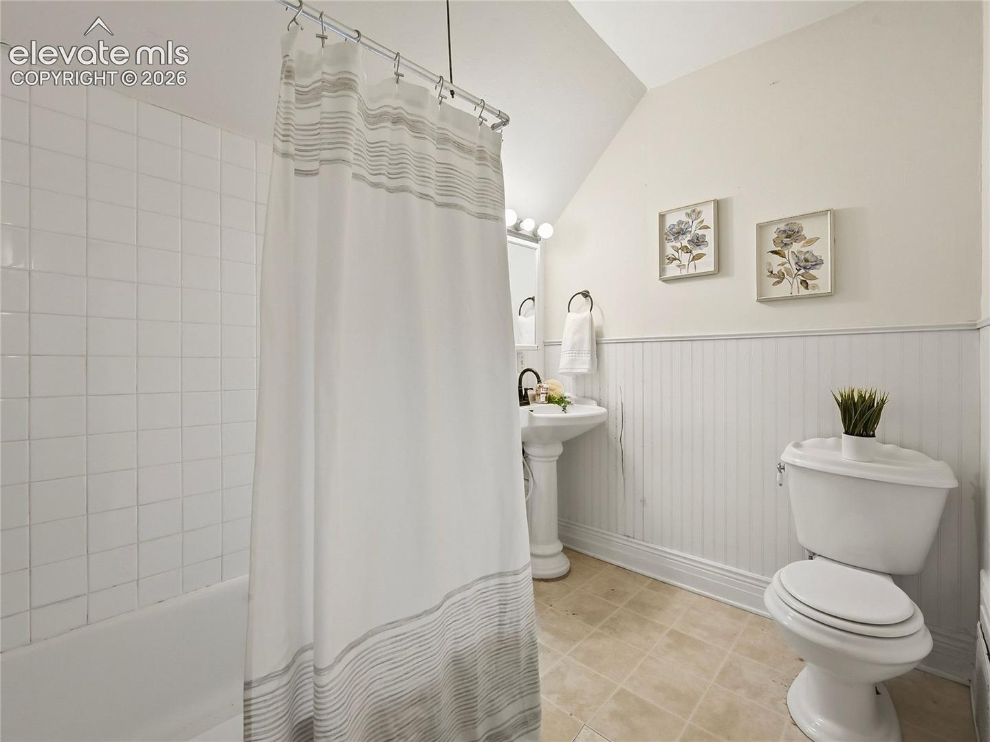 Full bath w/tub/shower combo.