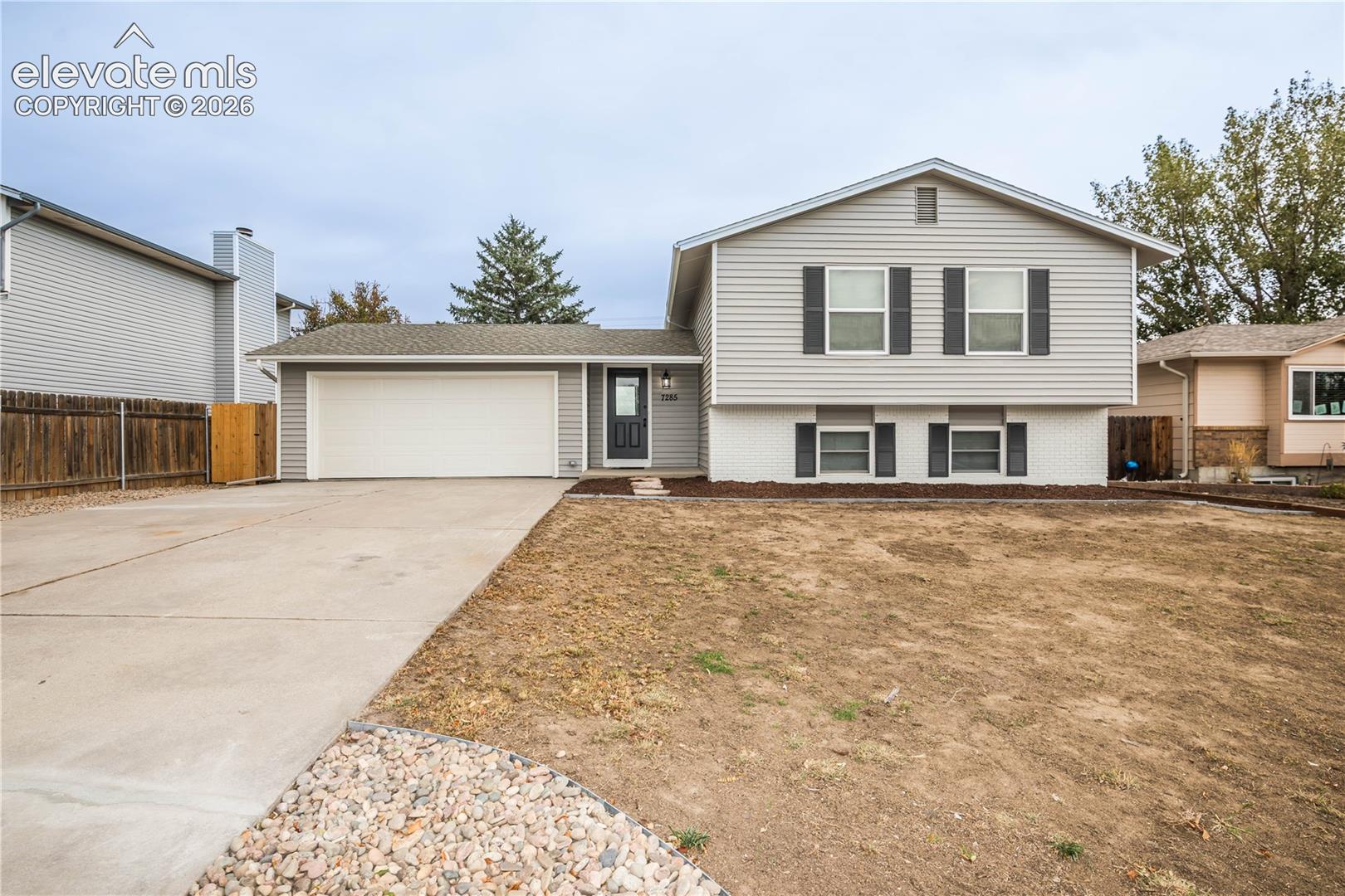 Fresh, modern, and remodeled from top to bottom! This is the kind of home where you can unpack and start enjoying from day one. This beautifully updated 4-bedroom, 2-bathroom home offers 1,736 square feet of thoughtfully refreshed living space. Inside, new paint and texture, new laminate flooring, new vinyl, plush new carpet, updated metal railings, and select new light fixtures create a bright, cohesive feel throughout. The kitchen has been transformed with new countertops, a stylish backsplash, and brand-new appliances, making it ready for everything from busy mornings to weekend entertaining. Both the upper and lower-level bathrooms have been completely remodeled with fresh, contemporary finishes. The updates continue with a new furnace and A/C for year-round comfort, while fresh exterior paint and a new garage door give the home a polished look from the moment you arrive. Complete with an attached 2-car garage, this move-in-ready home brings together modern style, meaningful upgrades, and plenty of room to settle in and make it your own. Schedule your showing today!