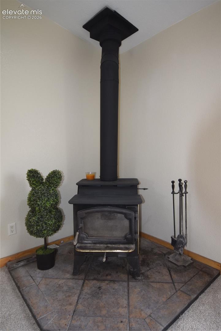 Freestanding wood-burning stove with a matte black finish