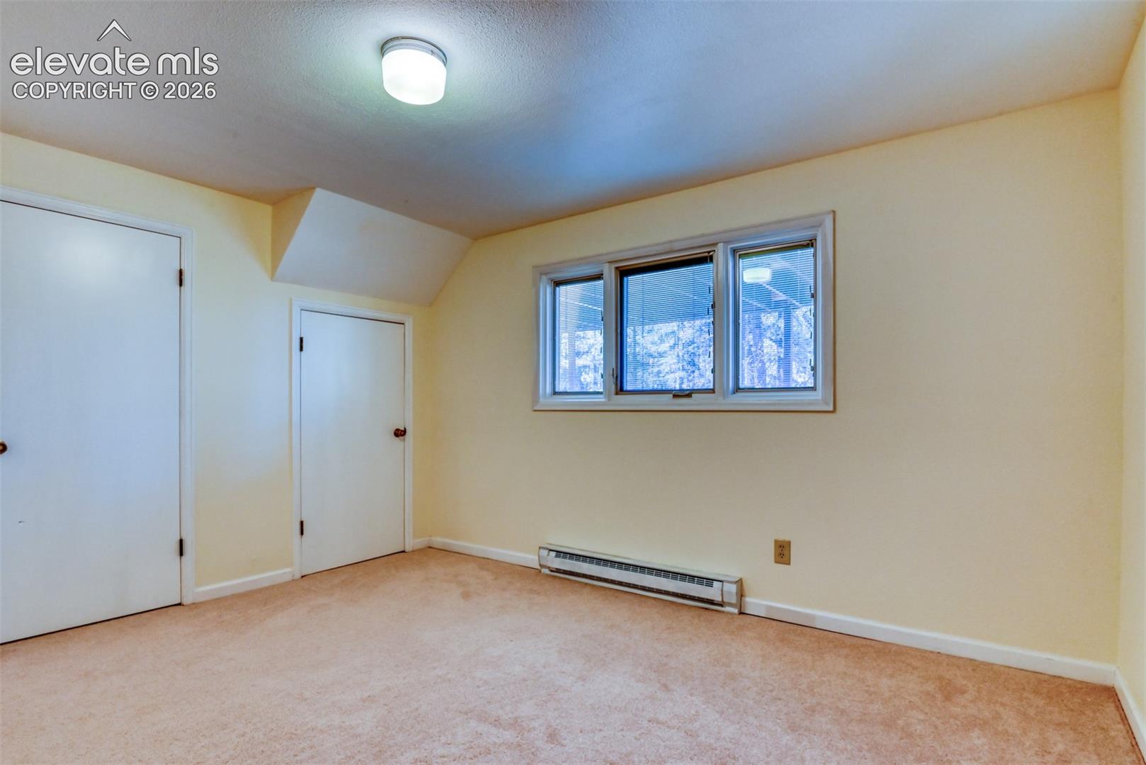 Basement bedroom 3 has great storage space with two with 2 closets. .