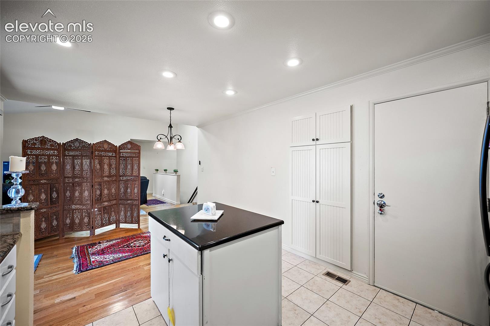 Open floor plan just remove the divider. 