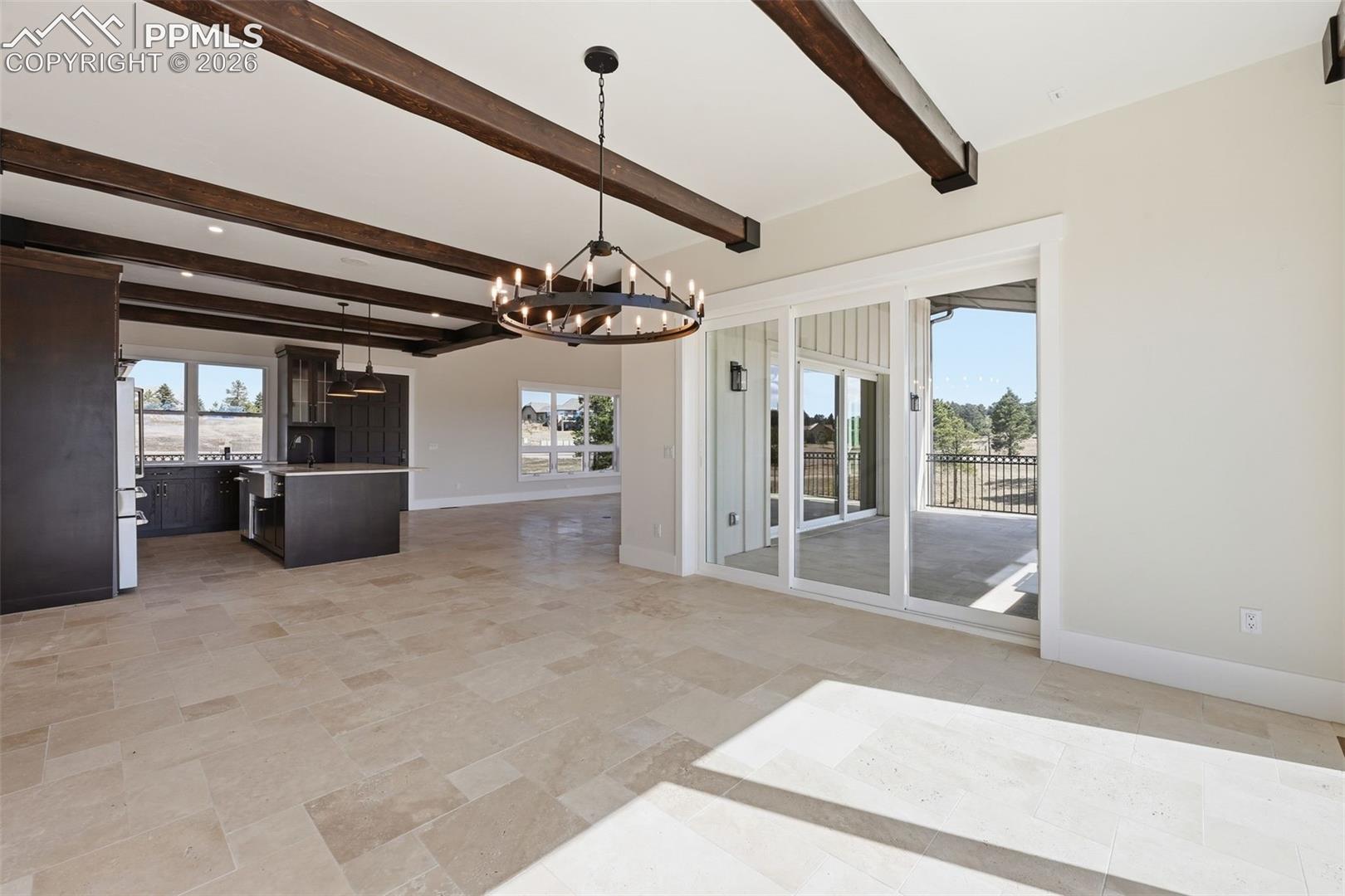 Dining Room, looking into kitchen; patio to right.