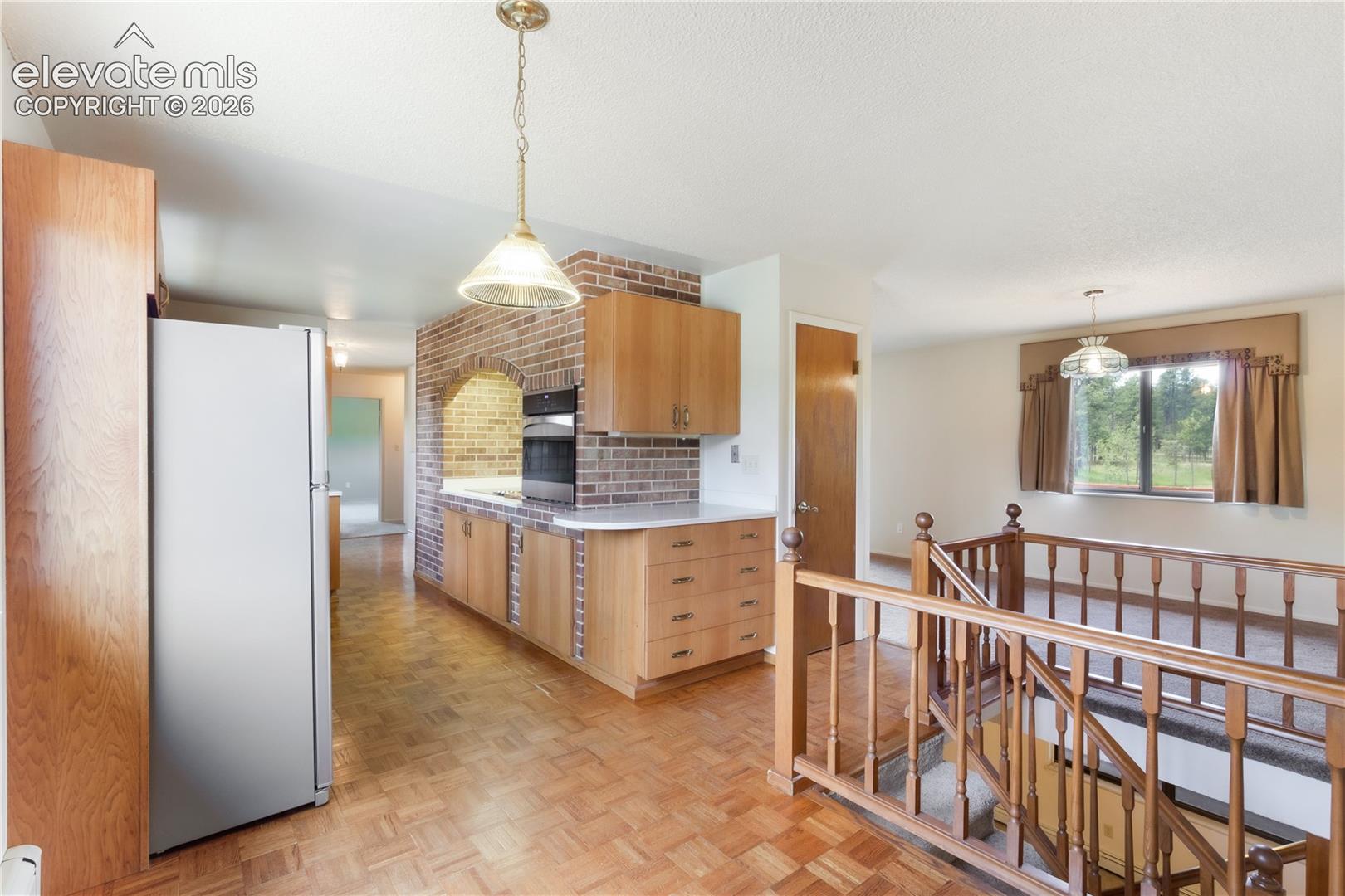 Kitchen and breakfast nook, looking toward the dining area