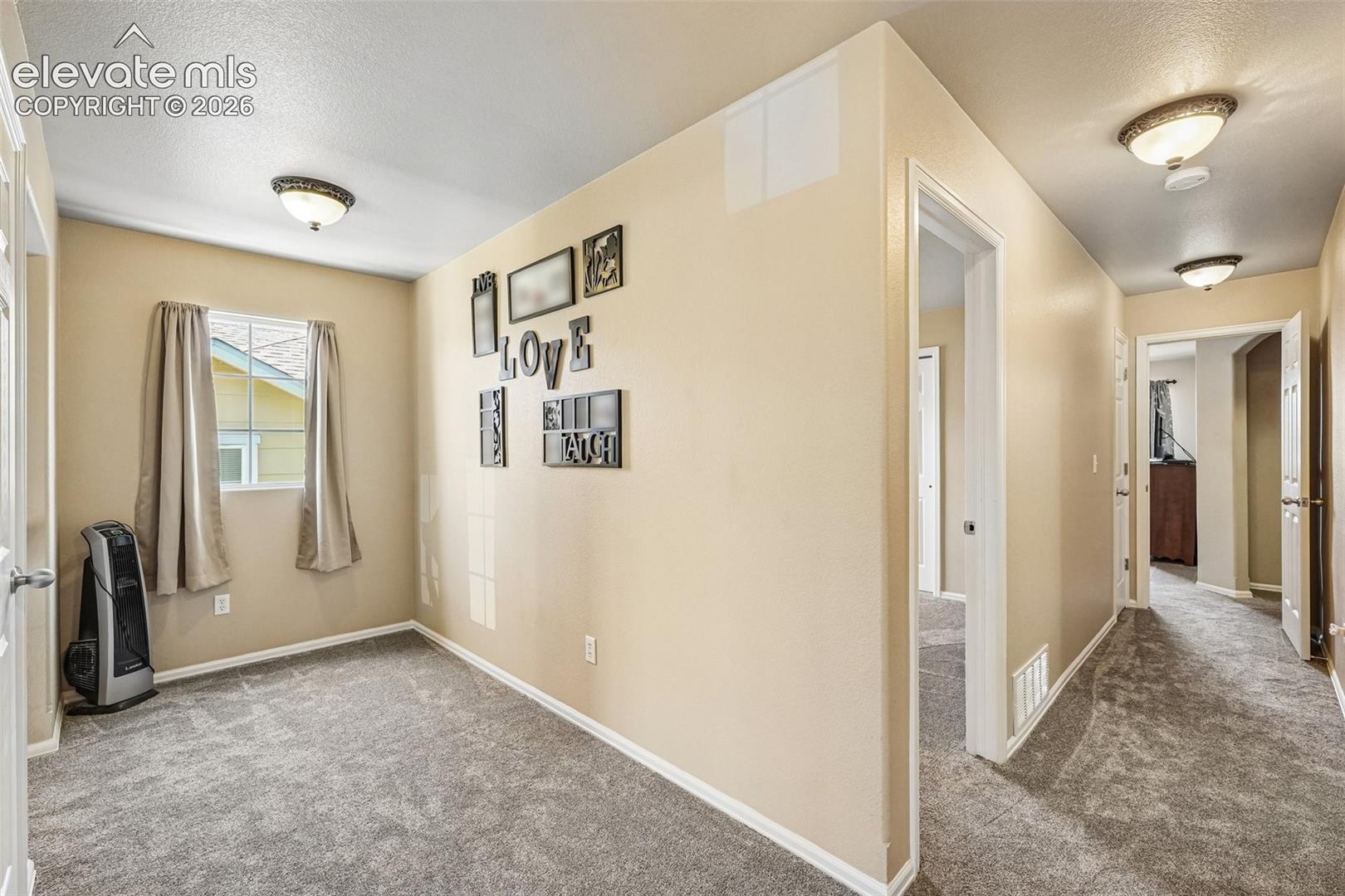 expaned landing/loft area at the top of the stairs