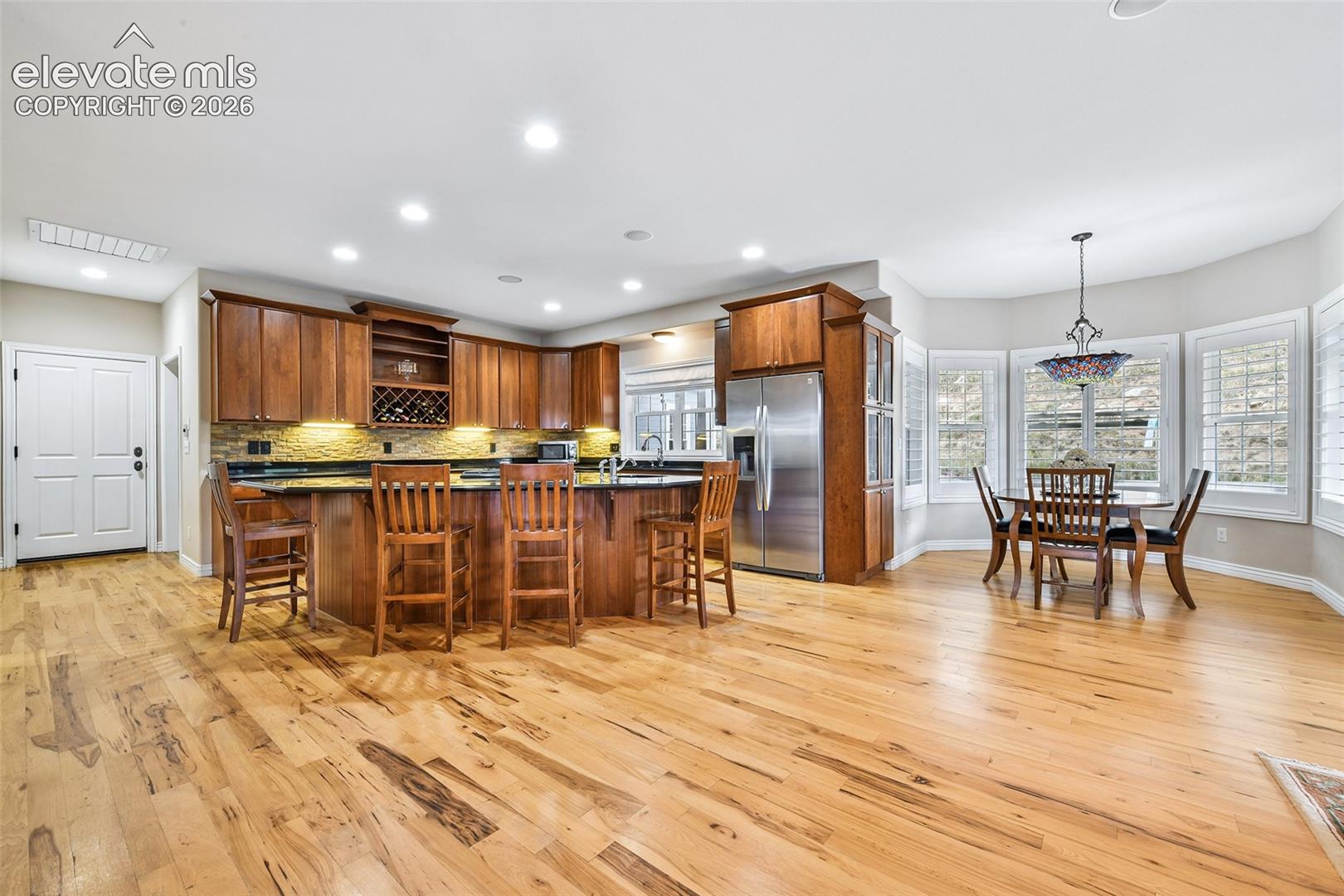 Gorgeous kitchen and dining area with natural views