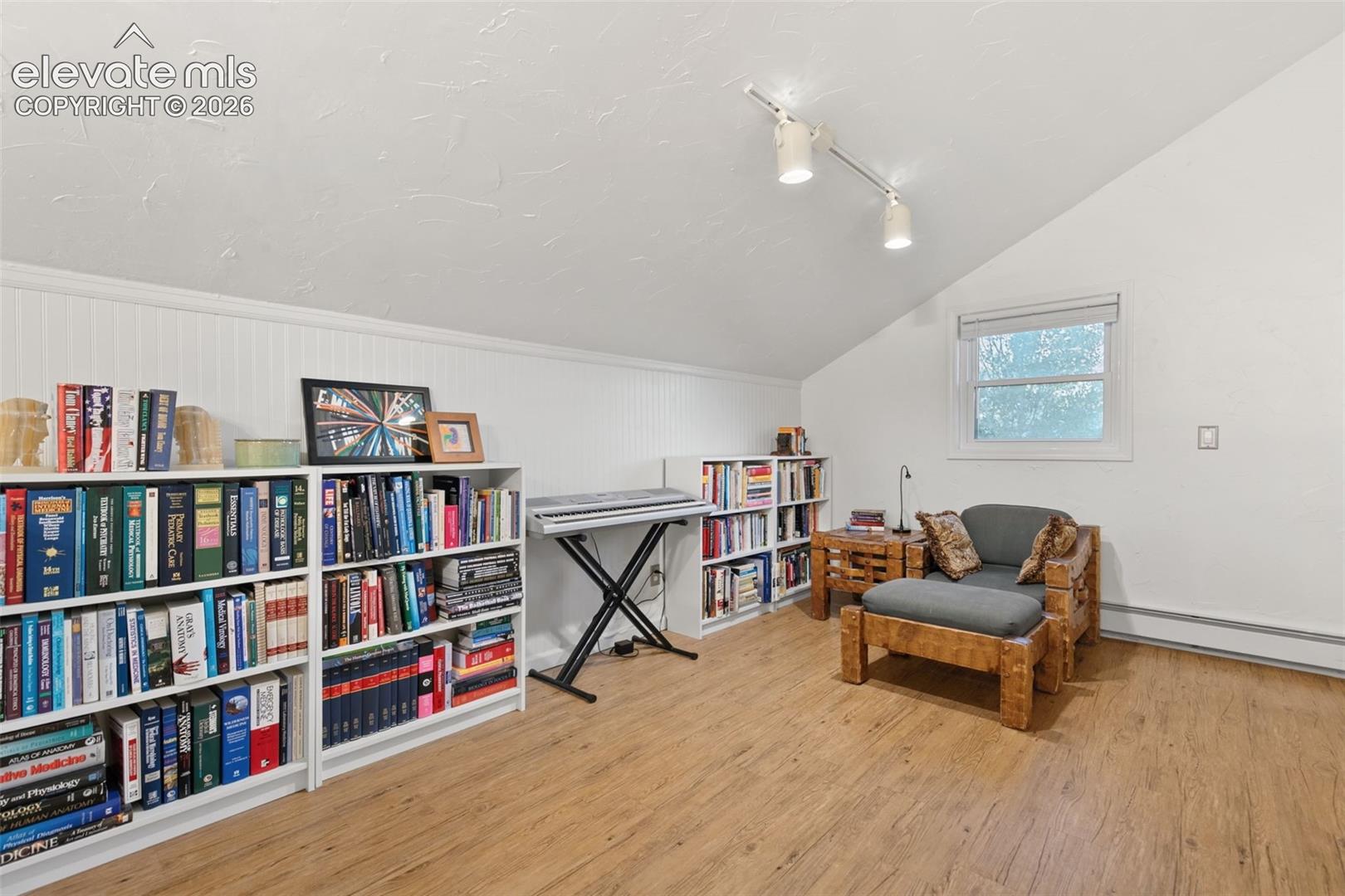 Upper Level TV, office playroom area 