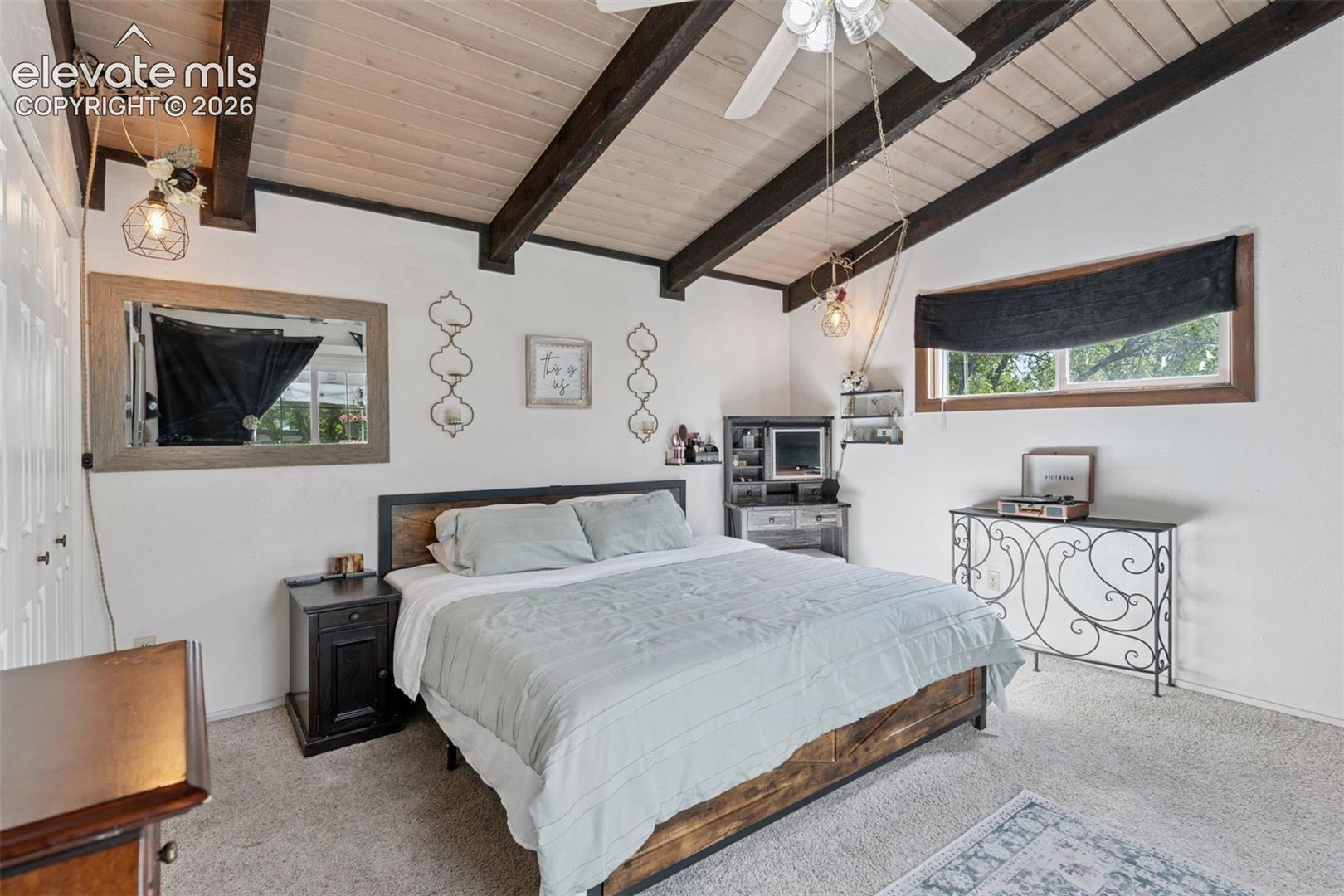 Primary bedroom in the second residence with a functional layout designed for long-term comfort or short-term rental use