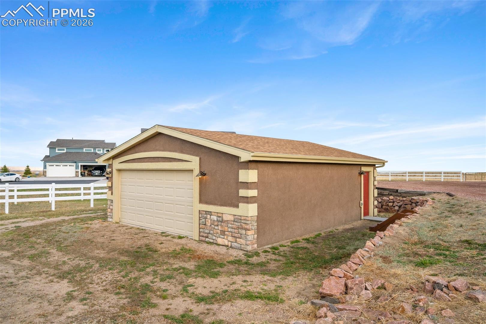 Additional 2 car garage for equipment, vehicles or storage