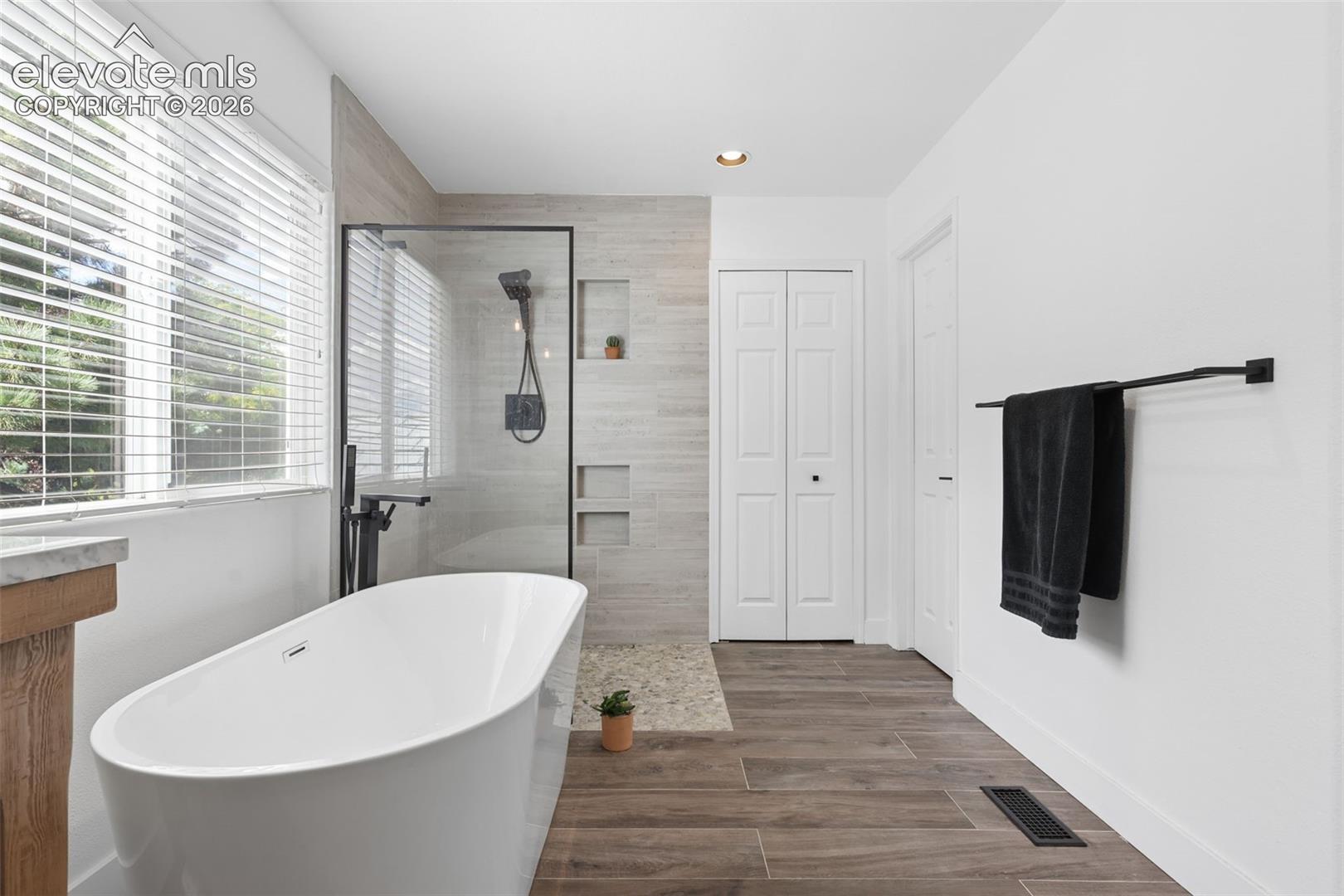 Primary bedroom 5PC bathroom located on upper level with walk in closet.