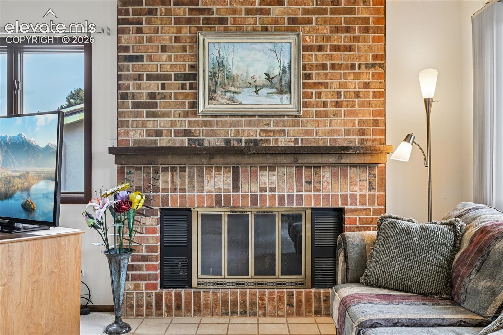 Cozy brick fireplace