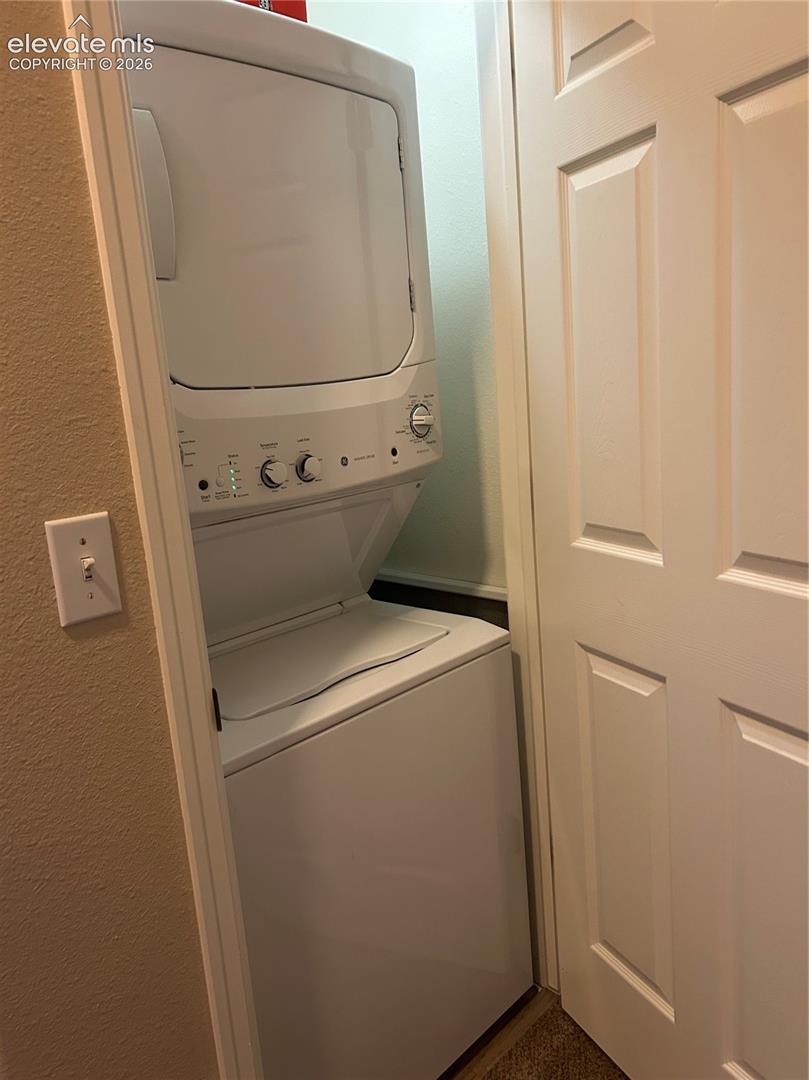 Upper level stackable washer and dryer.