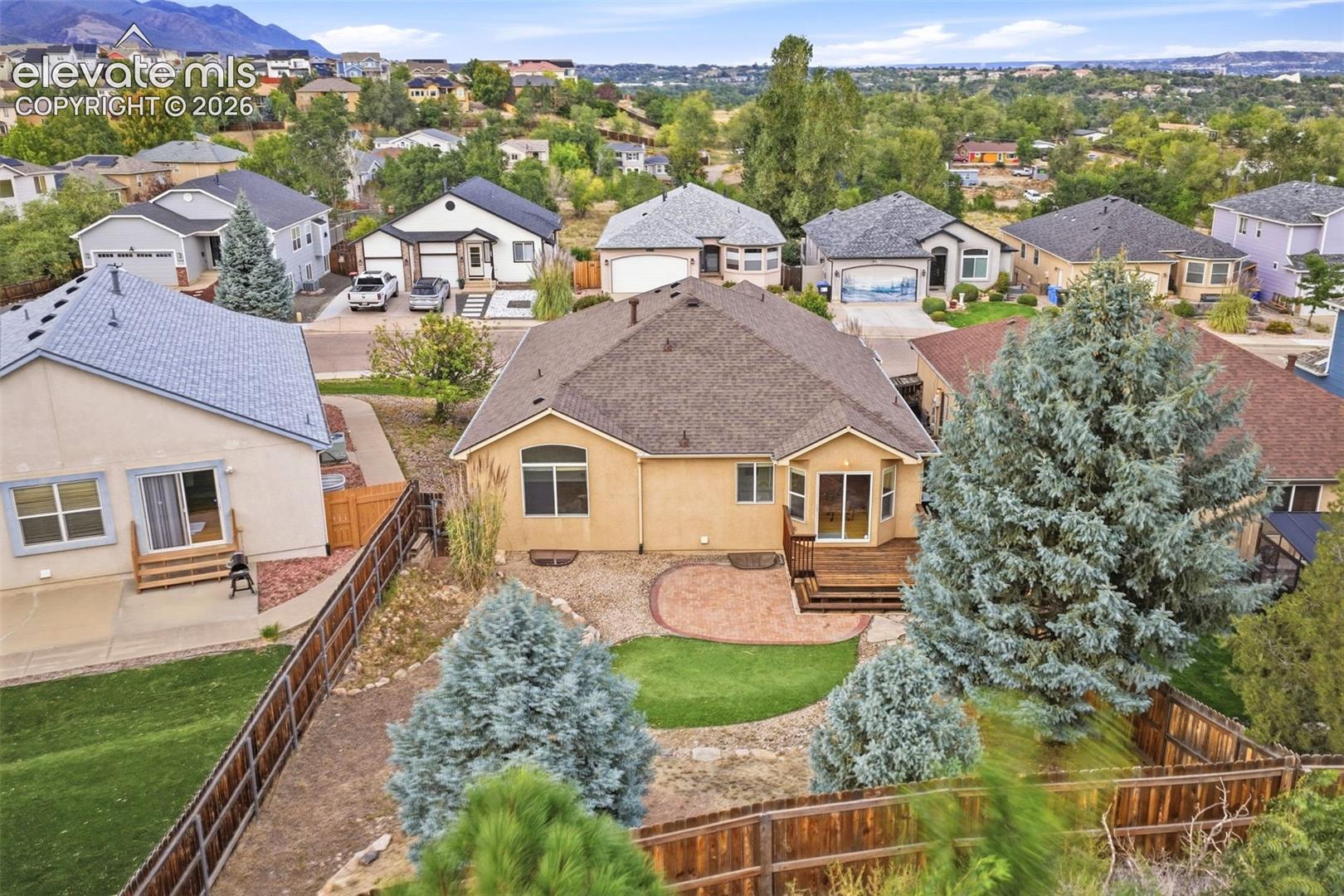 Gorgeous Aerial Picture of Backyard with Mountains in View