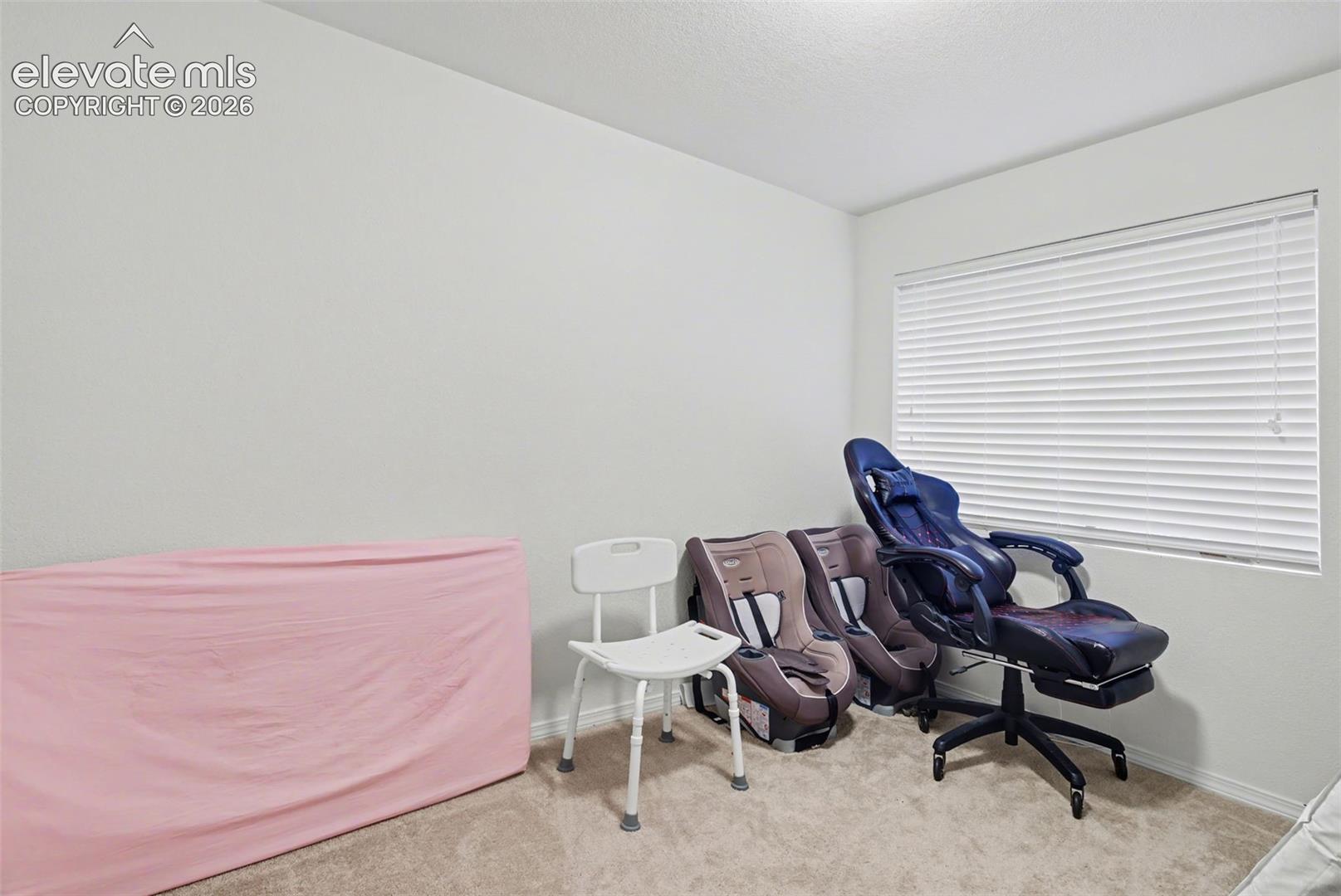 Bedroom #3 is in the basement.  There is a window & closet.  Currently being used for storage.