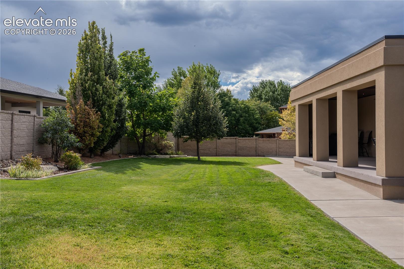 With a privacy fence all the way around and a 1/3 of an acre, this back yard gives you what you need