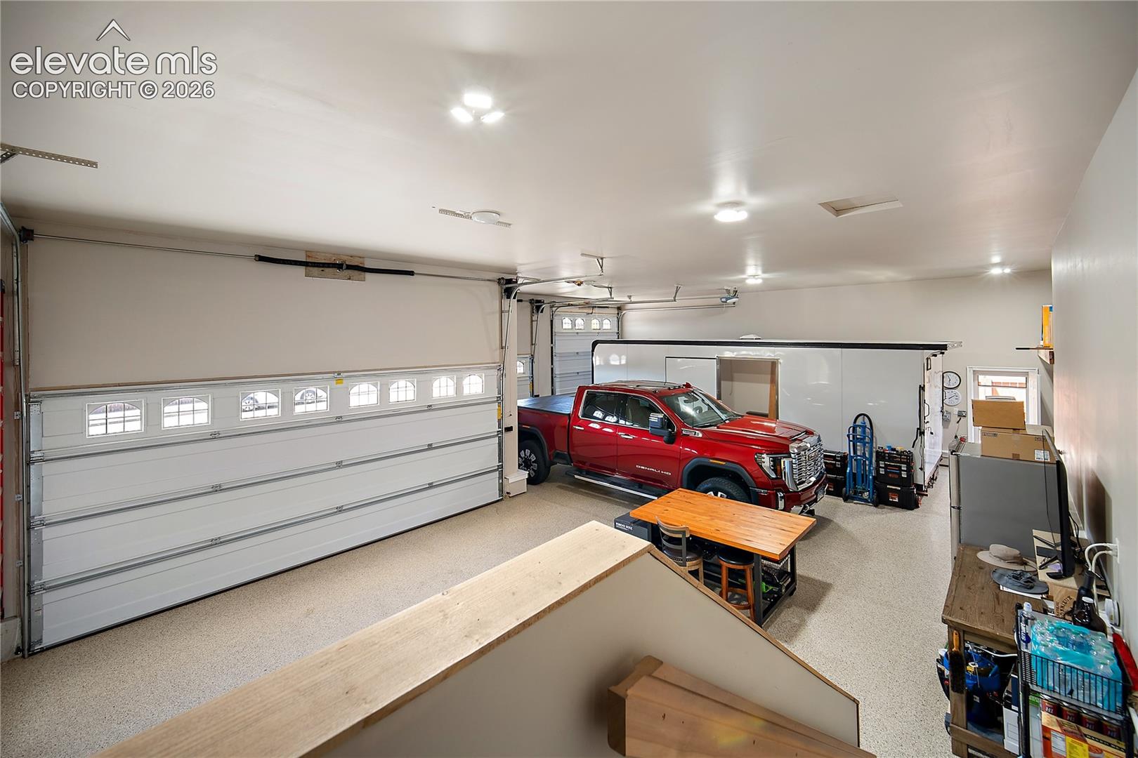Huge garage space with room for RV, toys and even a workshop. 
