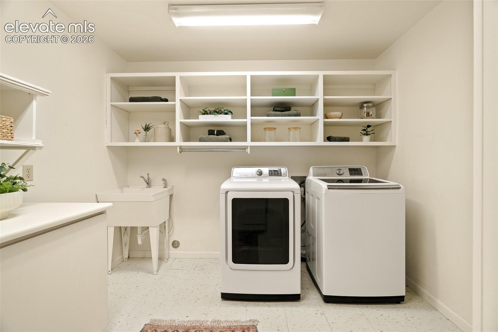 Basement laundry room photographed June 2026