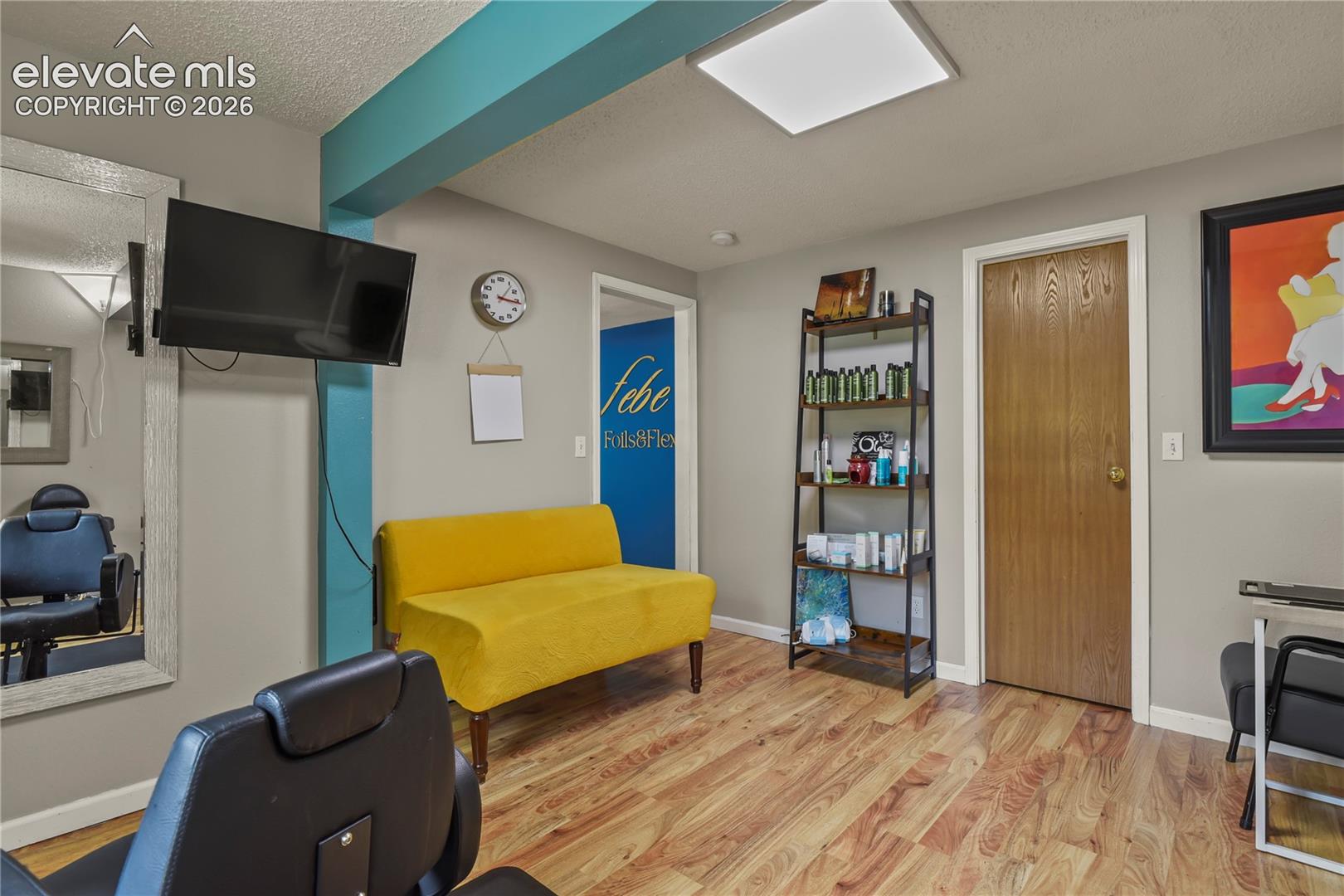 Bedroom currently used as a salon studio 