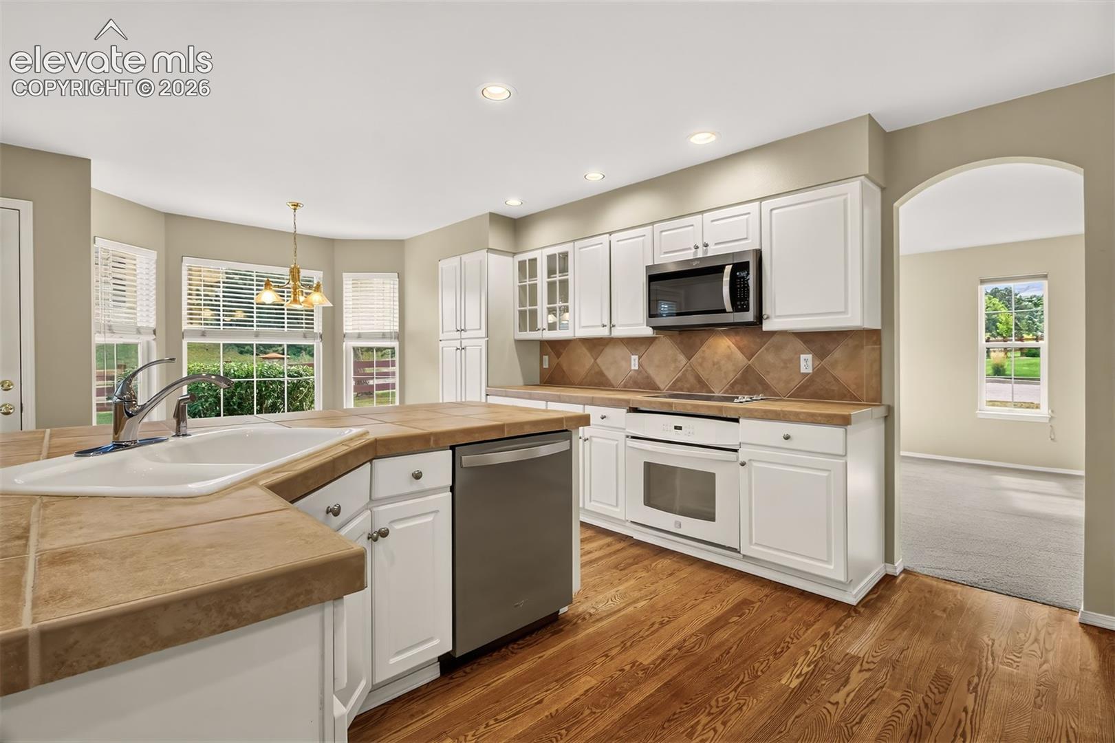 Hardwood Flooring, Tile Backsplash