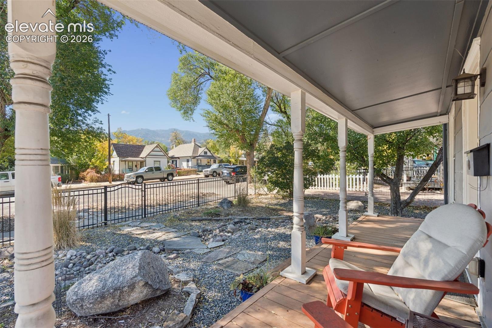 Covered front porch featuring and mountain views!
