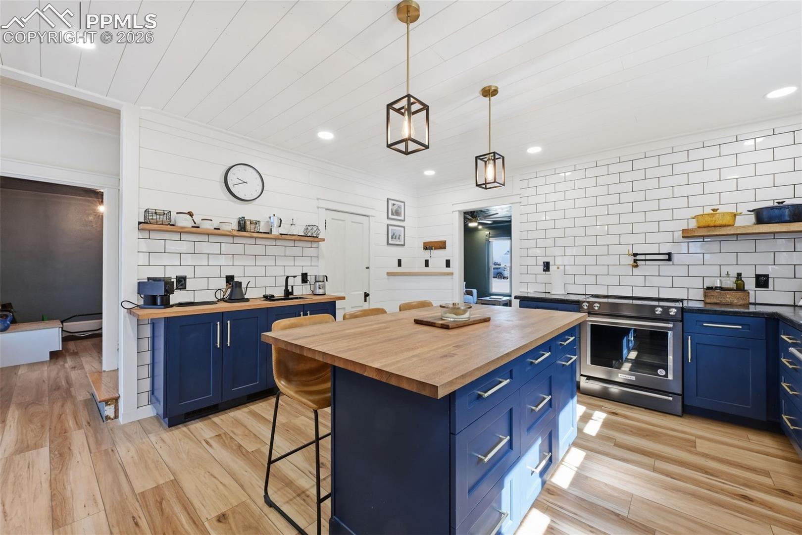 Coffee bar features a vegetable sink. 