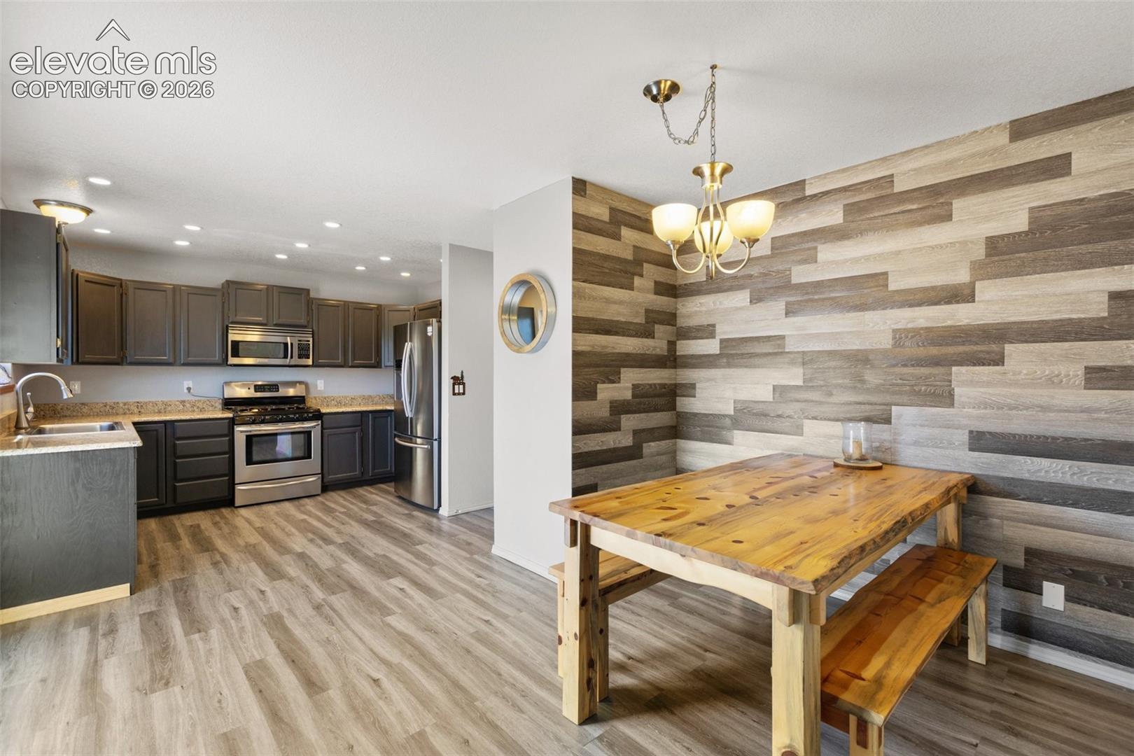 Kitchen and dining area with walk out. 