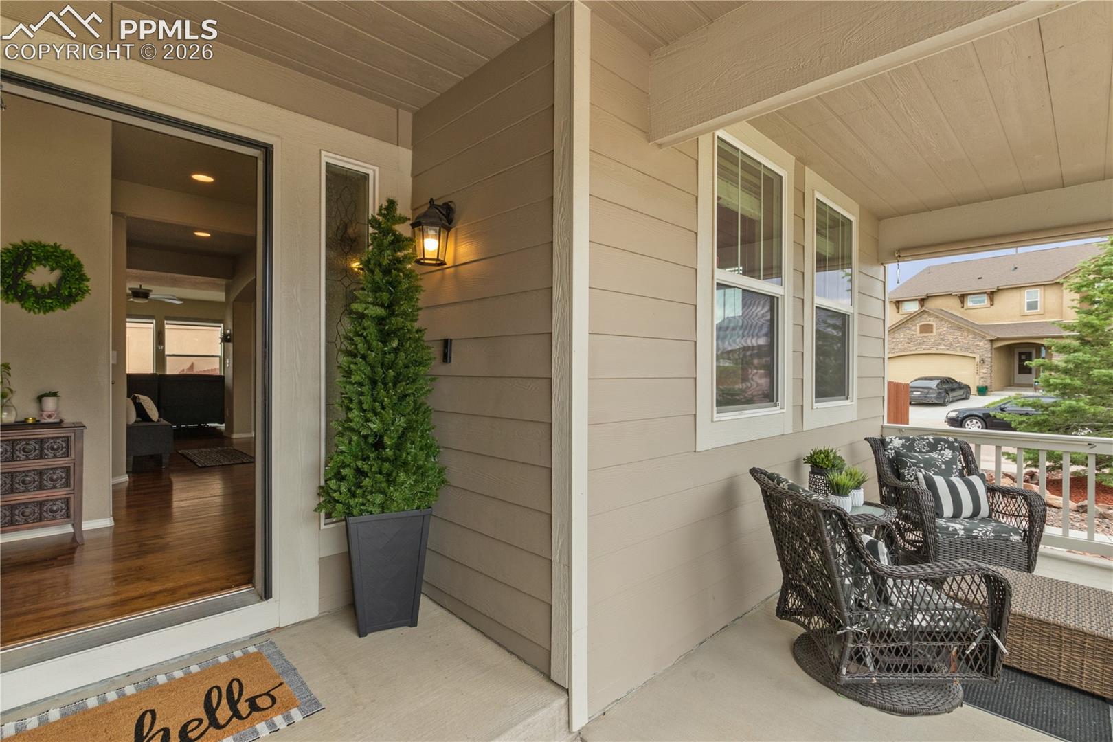 Property entrance with a porch