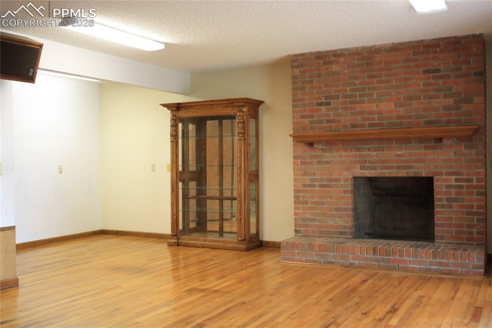 Family Room - Fireplace has gas line built in, needs insert
