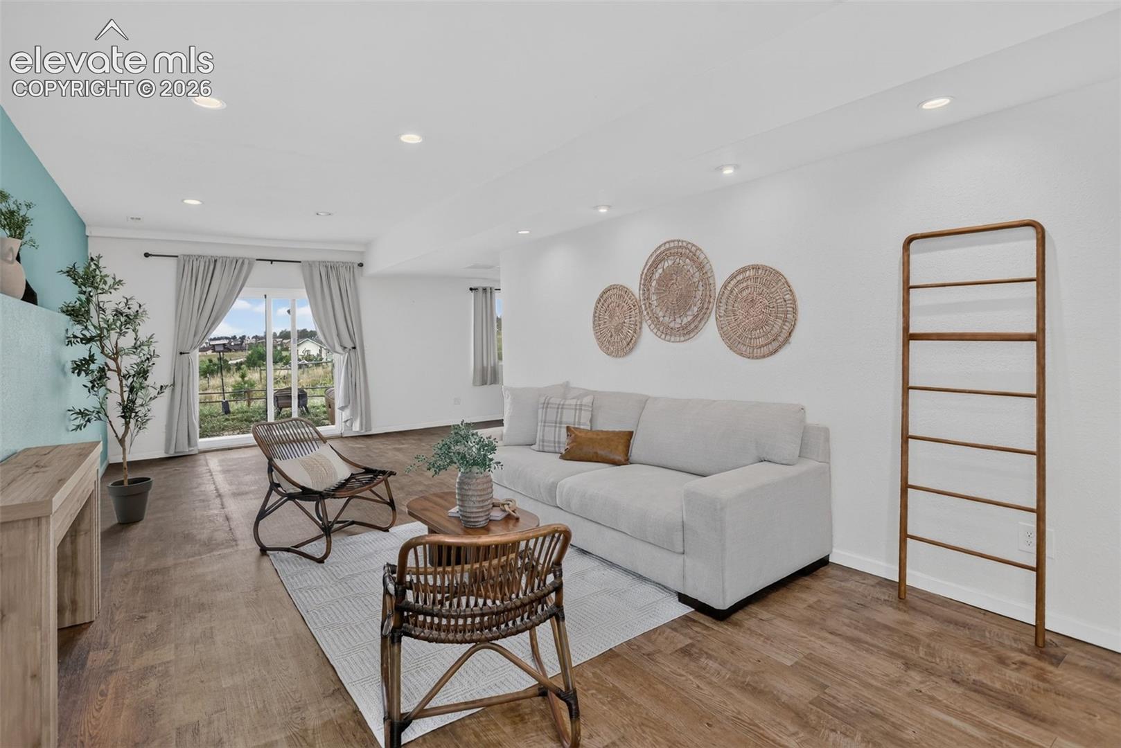 Downstairs family room that walks out to west facing covered patio.