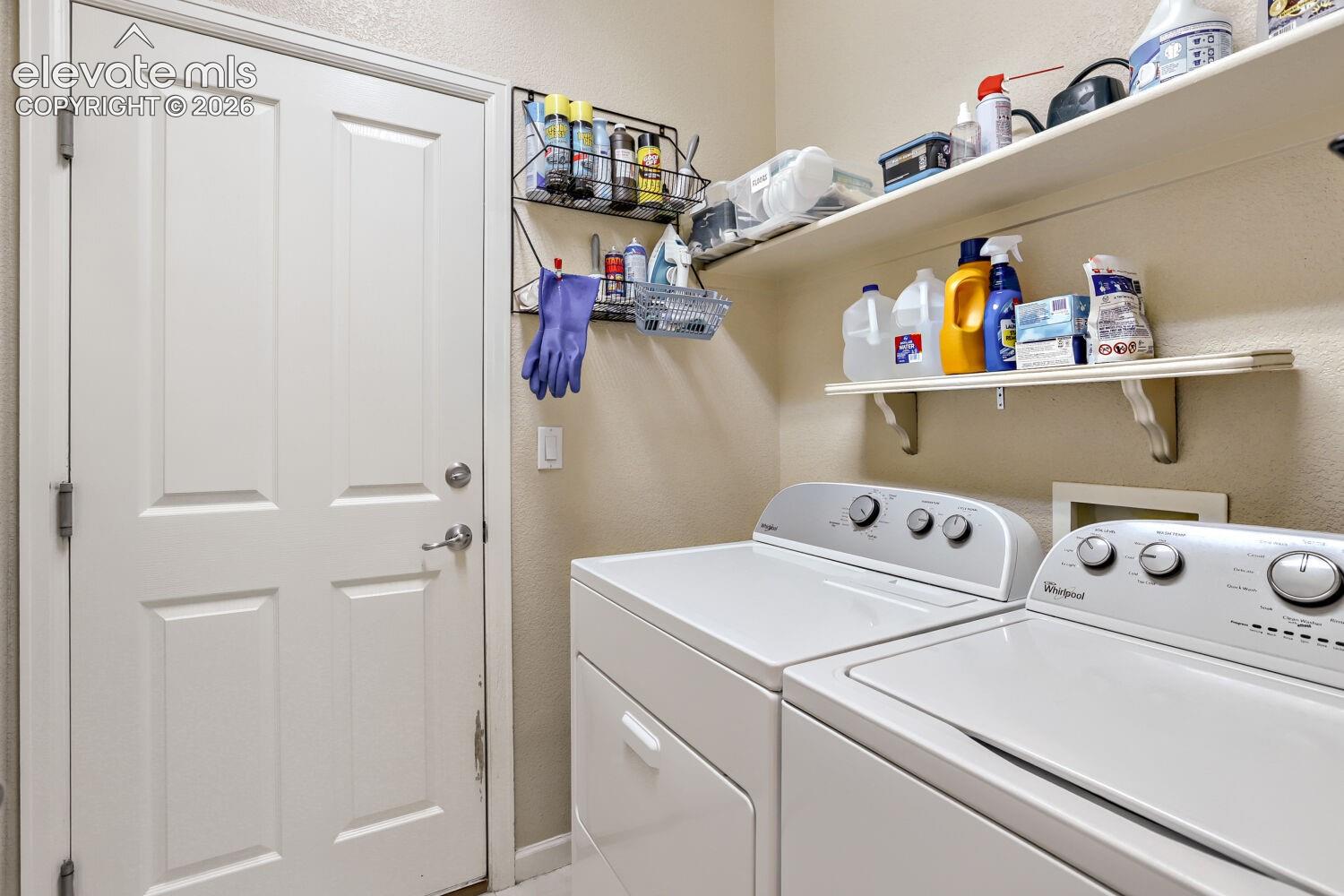 Main level laundry off of garage.