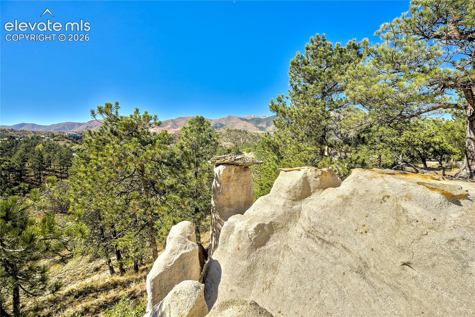 Dramatic rock formations, towering pines + miles of trails make nearby Ute Valley Park a northwest Colorado Springs treasure.