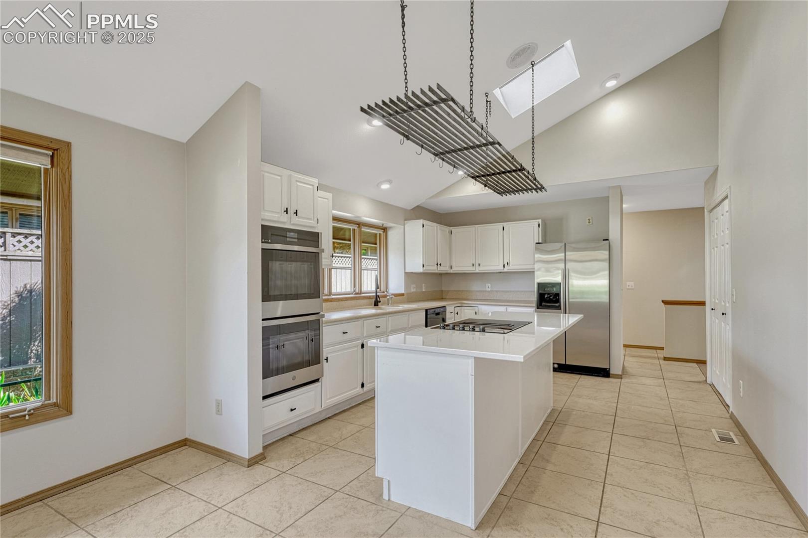 Vaulted Tiled Island Kitchen, Skylight