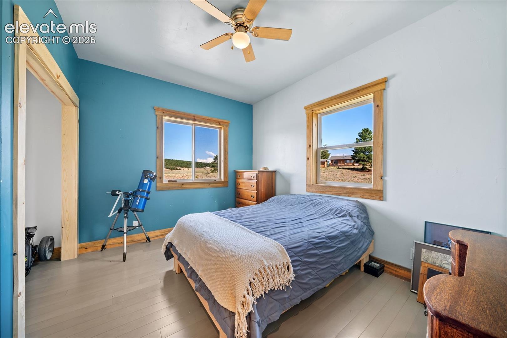 Spacious main-level bedroom with natural light.