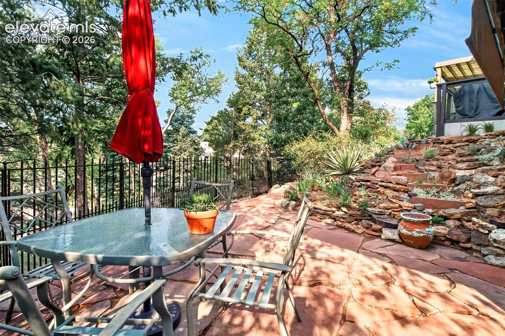 A private flagstone patio off of the walk-out basement