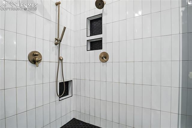 Bathroom with a tile shower