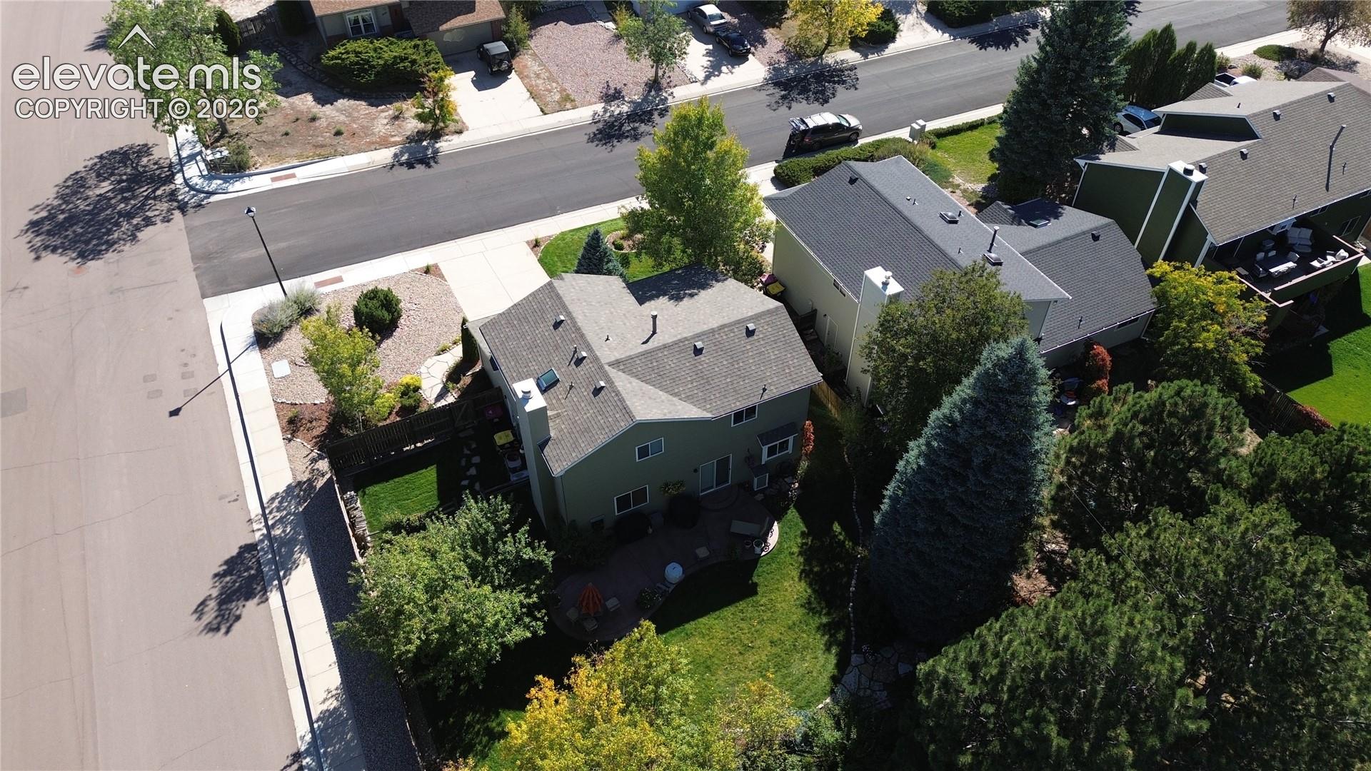 Aerial rear view of home and lush backyard, check out the greenway behind the backyard