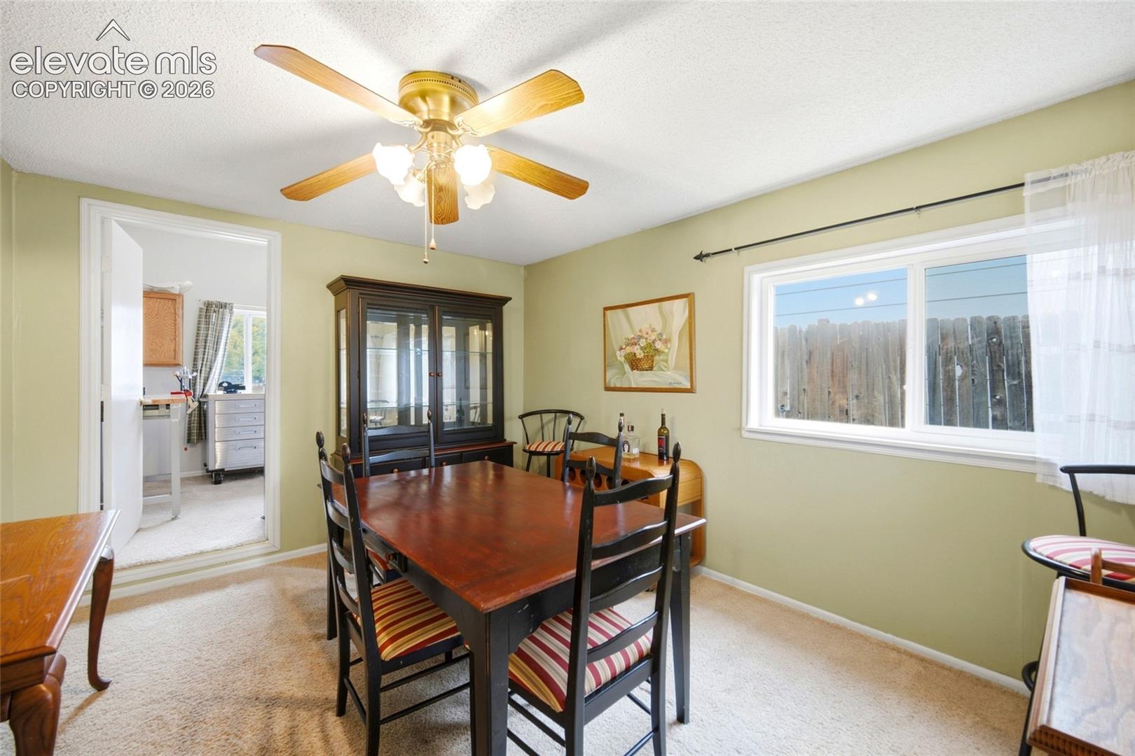 This room is the converted old garage giving the home much more livable space. 