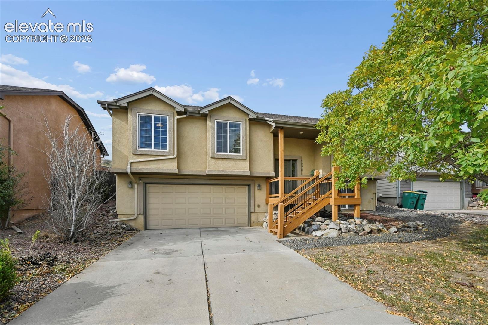 **Move-In Ready 4-Bedroom Home on a Large, Private Lot!** This spacious 4-bedroom, 3-bathroom home features an updated kitchen with new cabinetry, granite countertops, and a tile backsplash. The inviting living room showcases a double-sided fireplace that adds warmth and ambiance to both the living and dining areas.  The primary bedroom offers direct access to the backyard and an attached 3/4 bath. Three additional bedrooms provide flexibility for guests, a home office, or other needs. A full bathroom and an additional 3/4 bath offer added convenience.Enjoy the outdoor space with new concrete patios and firepit.  The backyard is fully fenced for convenience and privacy. Front porch has been recently stained. The 2-car garage includes an additional shop area, offering extra room for projects, hobbies, or storage.Recent updates include a new water heater, furnace, and a/c.  New light fixtures and ceiling fans throughout. The washer and dryer may stay or be removed at the buyer's preference. With generous living space, a large private lot, and valuable updates, this home is ready for its next owner!  Minutes away from I25, Fort Carson, shopping and more.