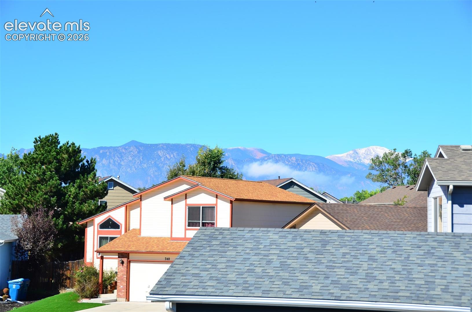 Mountain backdrop featuring a snow-capped peak