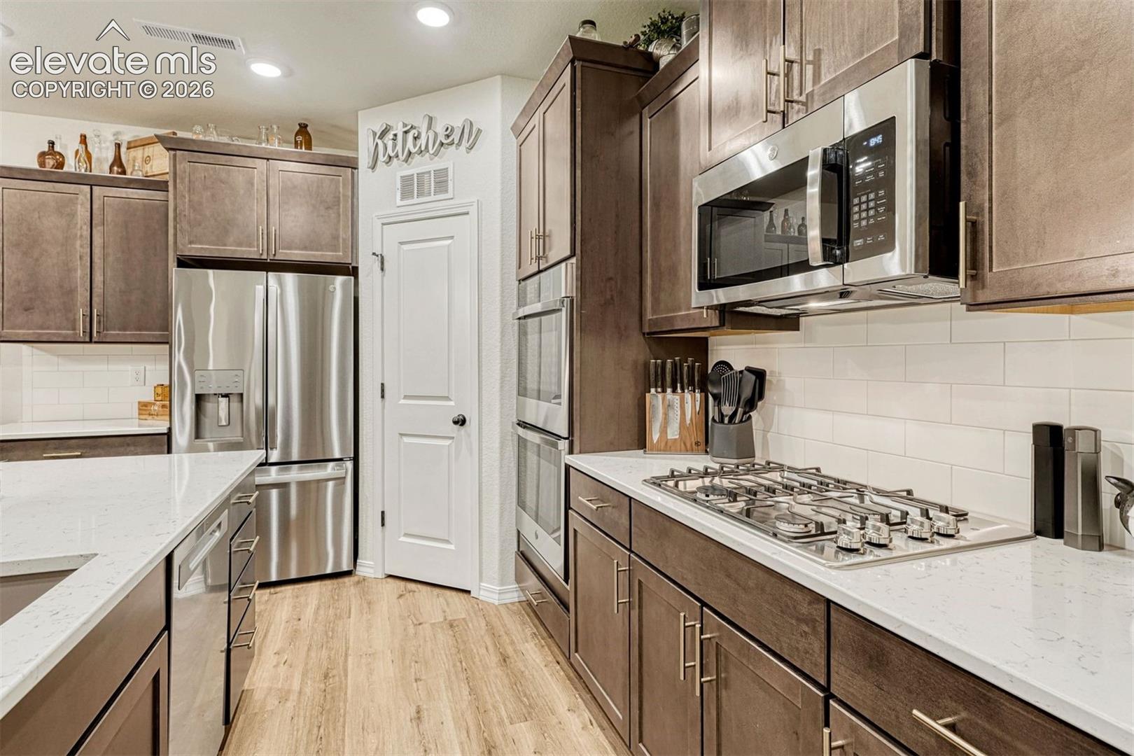 Walk in Pantry, Gas cook top and Double wall ovens plus microwave