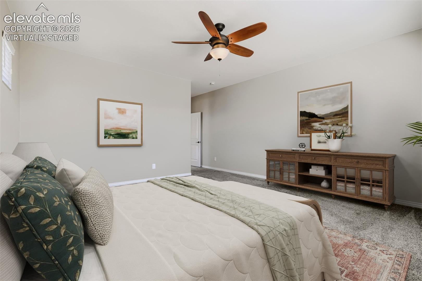 Virtually staged primary bedroom with lux bath and huge closet.