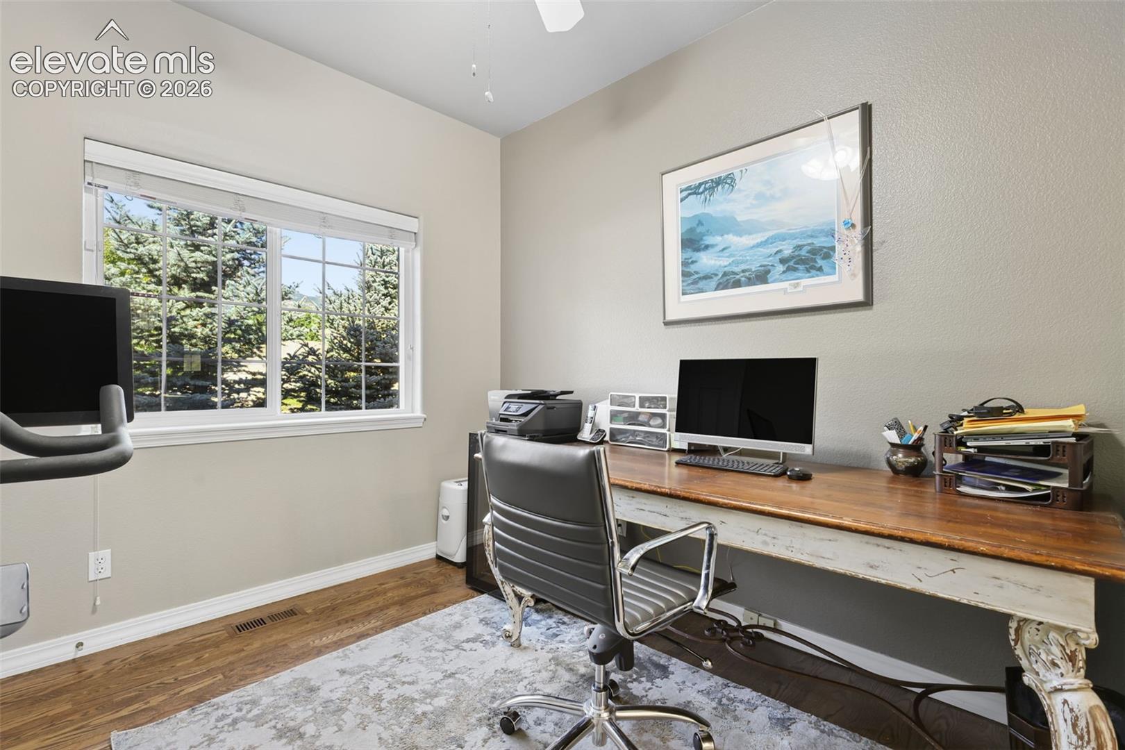 Main level office has closet and french doors.