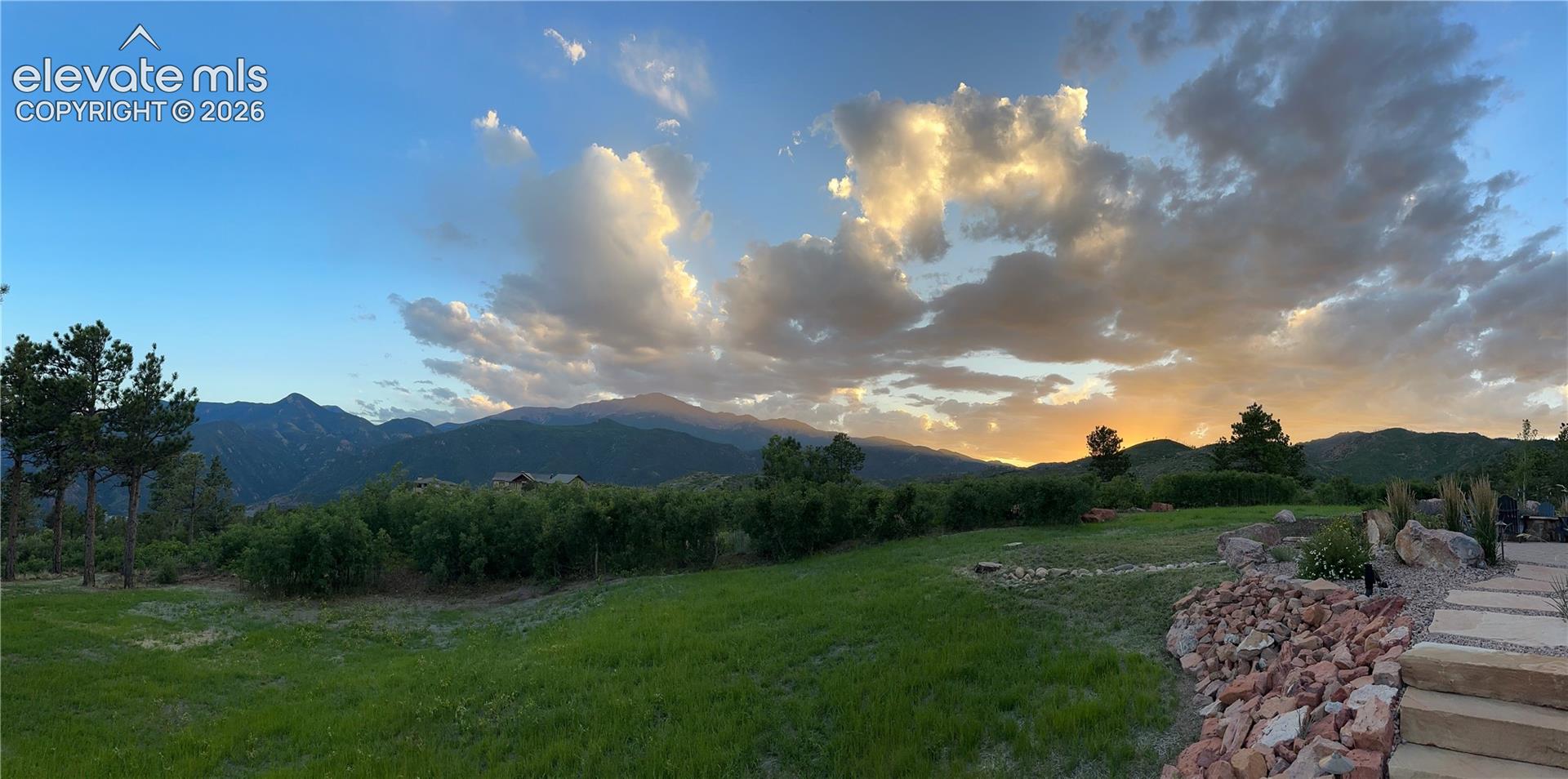 Summer on the back lawn. Mountains, meadow & room to breathe.