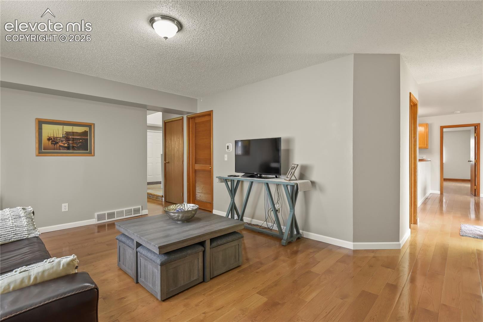 Main level family room with view toward slider to deck
