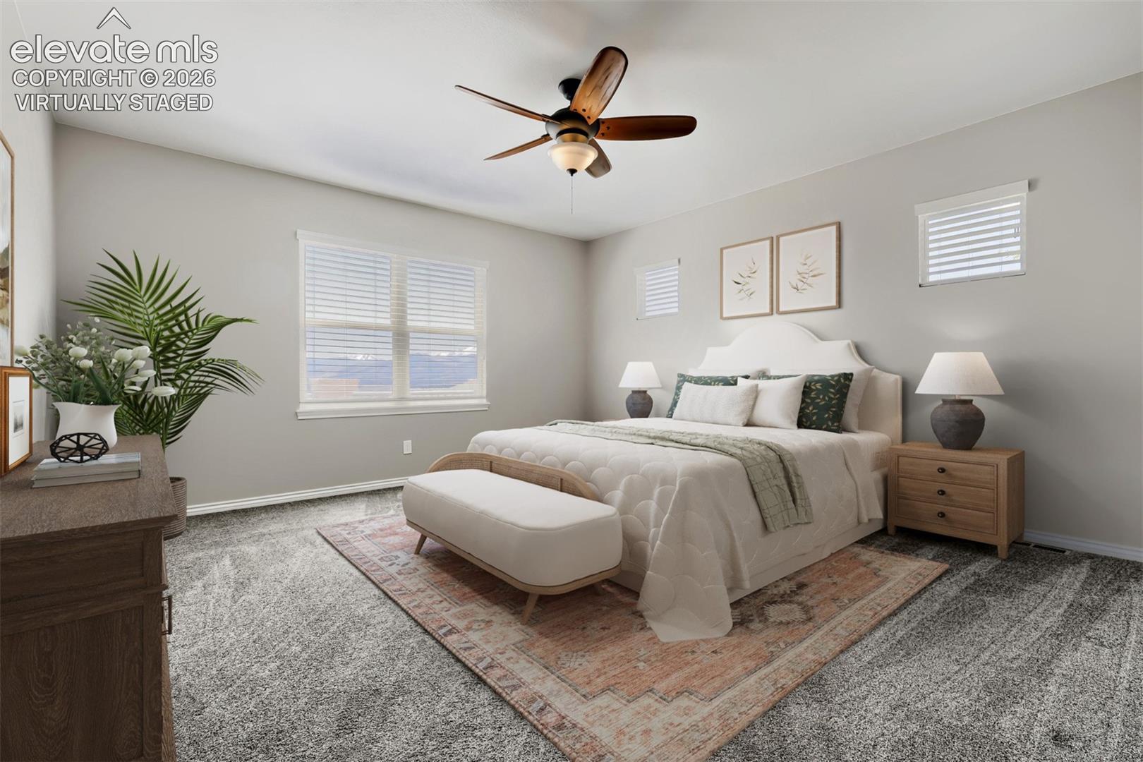 Virtually staged primary bedroom with lux bath and huge closet.
