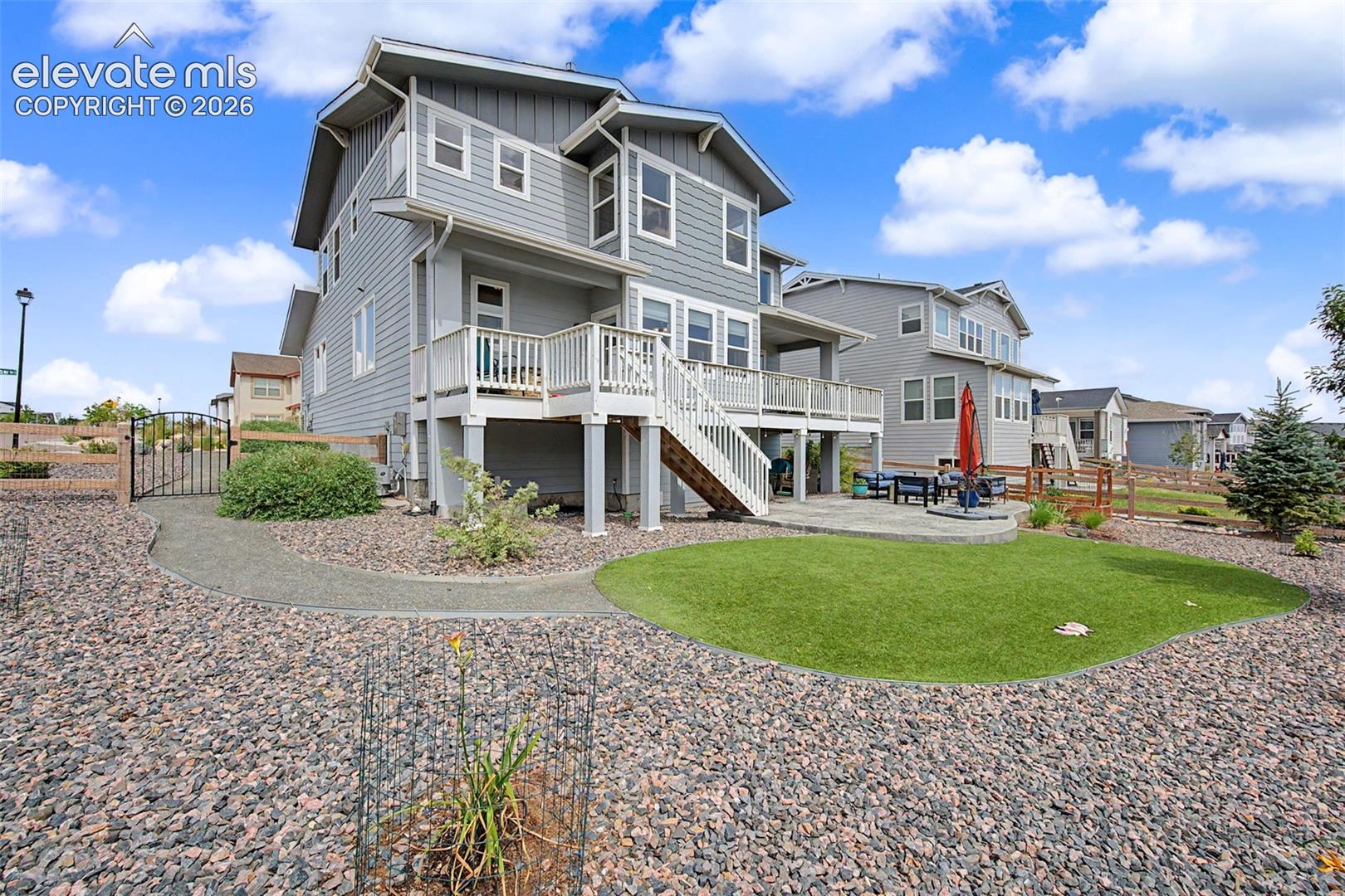 The beautifully landscaped yard can be enjoyed from the expansive deck which spans 40 ft 6 in along the back of the home. One area is 14'x12' and a 2nd area is 8'6"x12' connected by a 14'x4' walkway.