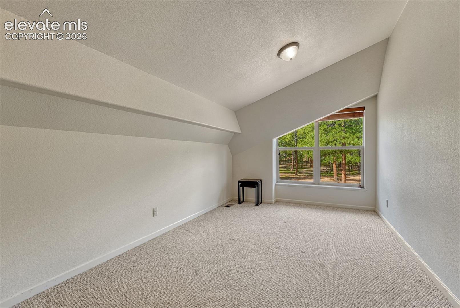 1 of 3 upper level bedrooms plus adjoining bath