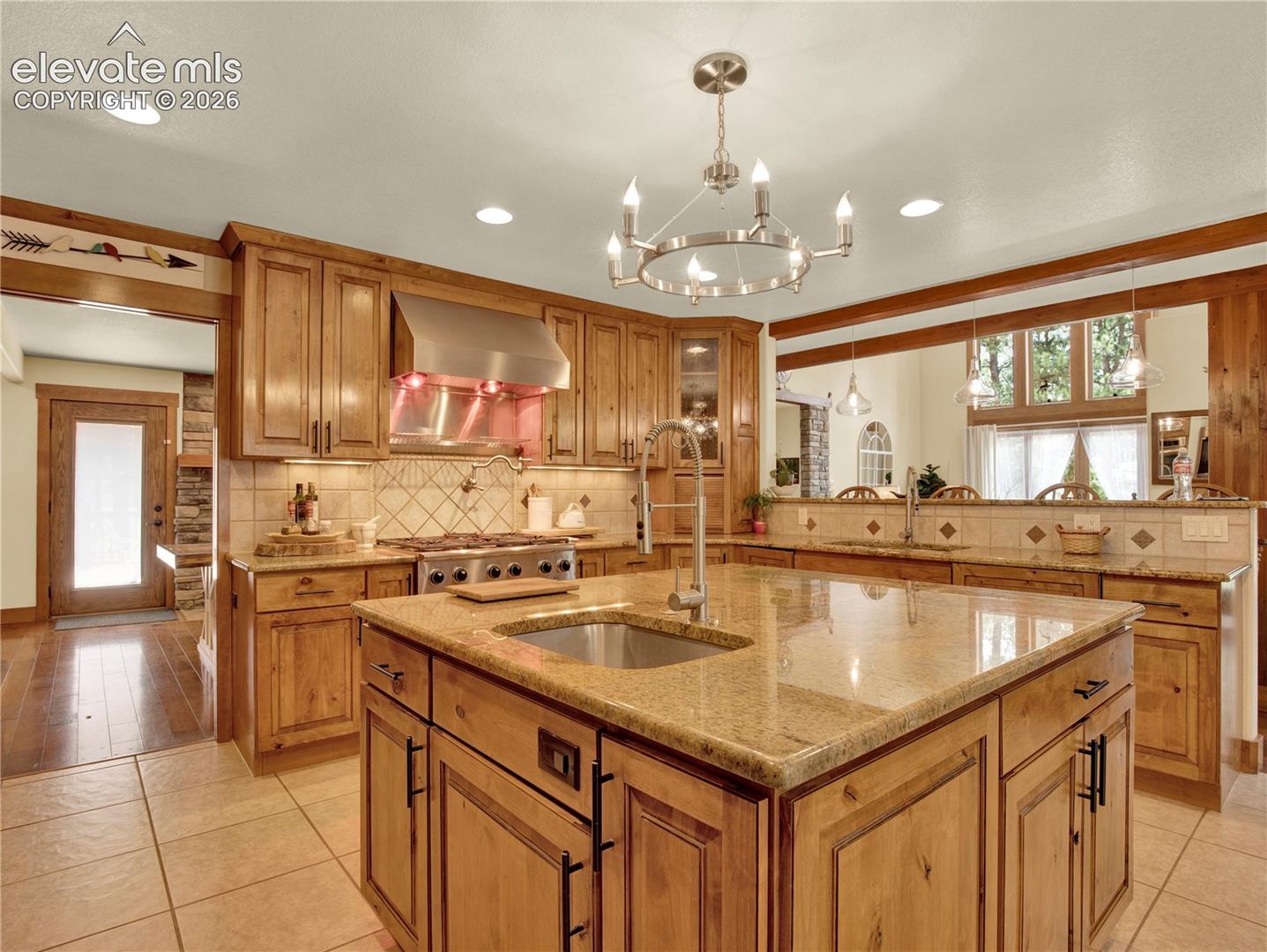 The kitchen island is complete with a secondary sink