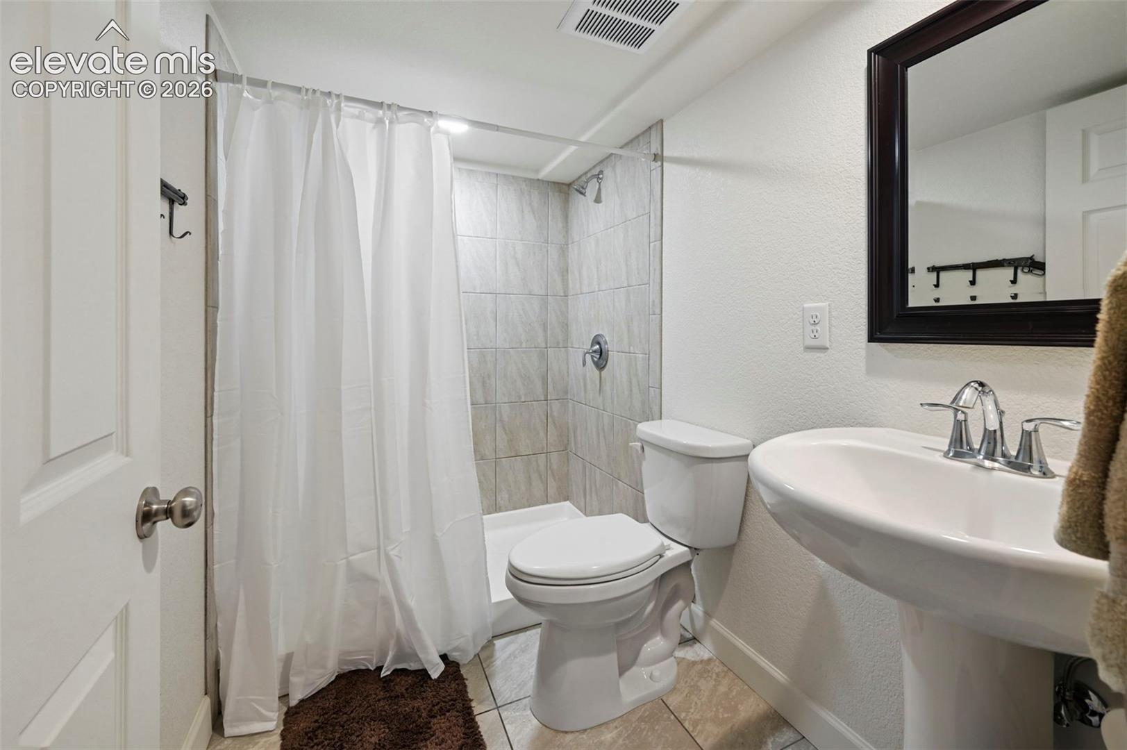 3/4 bathroom attached to Bedroom 5 in Basement