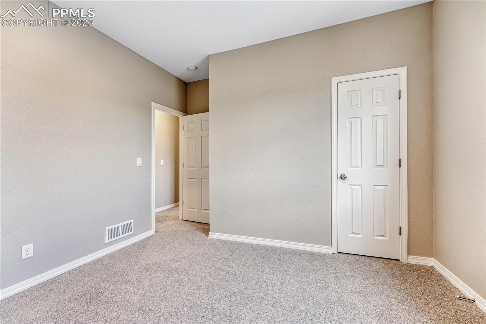 Choose the carpet and paint for both bedrooms!