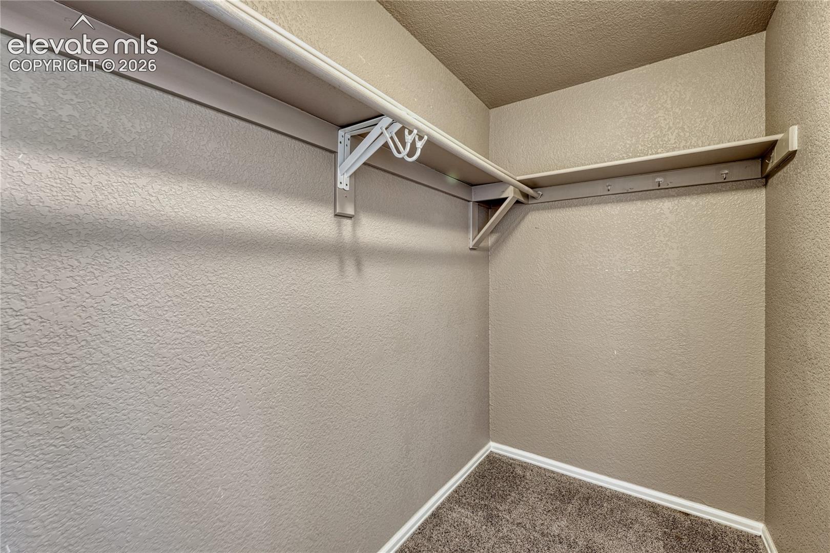 Walk in primary closet!